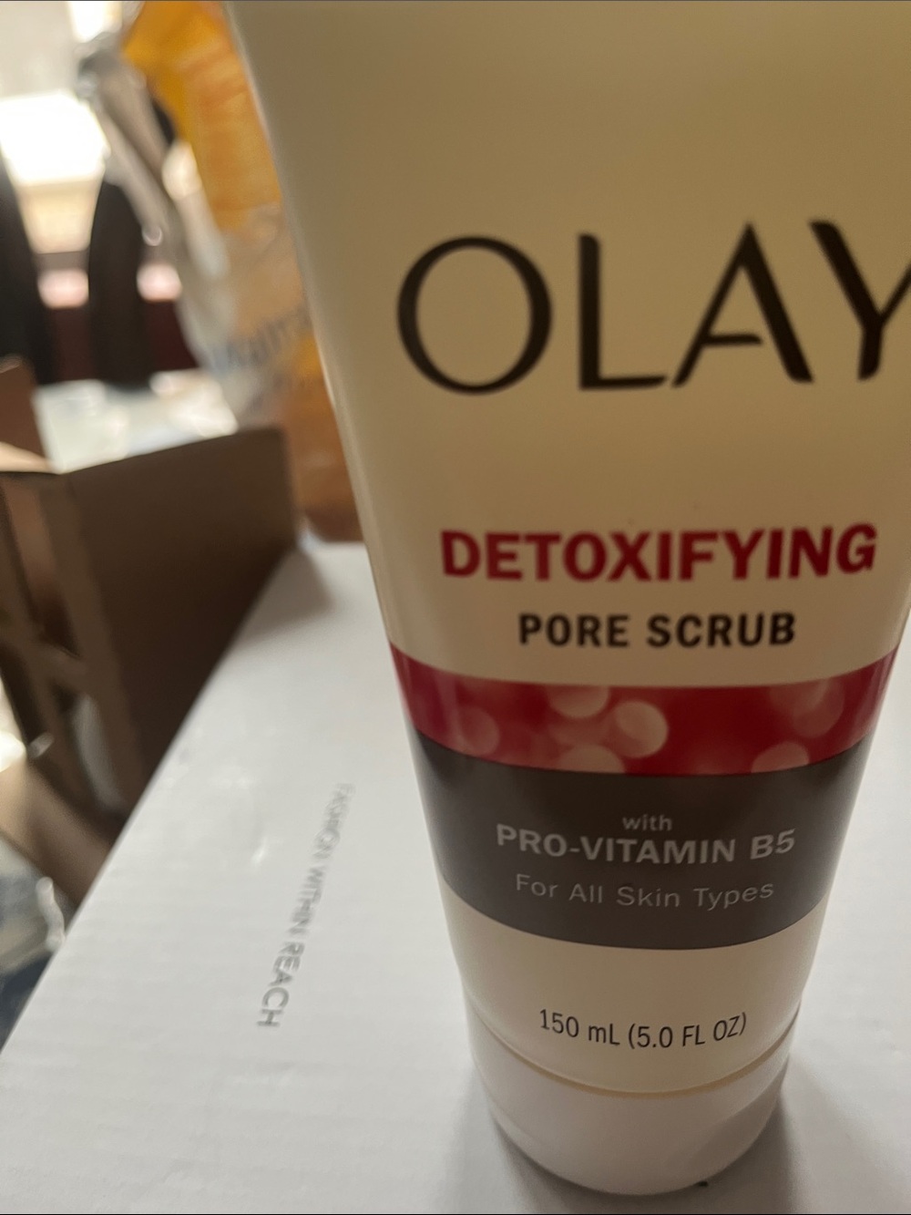 OLAY Detoxifying Pore Scrub - Cream and Red Accents